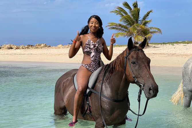 Bamboo Rafting & Horseback Ride n Swim Guided Tour in Montego Bay - Scotchies stop: casual Jamaican food without the pressure