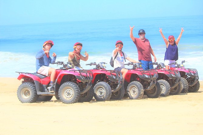Cabo Desert ATV & Beach Horseback Combo enjoy adventure and beauty! - Gear-up moment: helmets, bandanas, goggles, and water