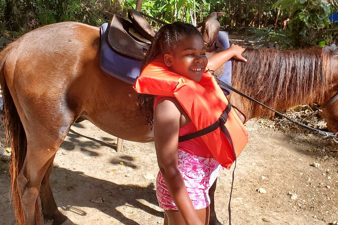 Dunn's River Falls Climb, Zipline and Horseback Riding Private Tour - Zipline over the canopy: fun plus clear shoe rules