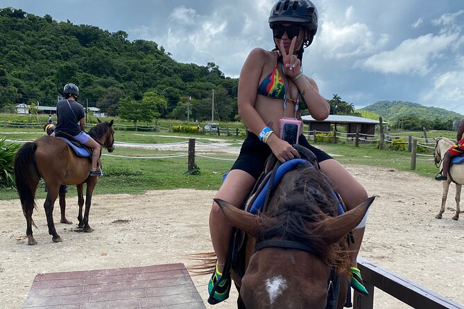 Great River Rafting Limestone Foot Massage and Horseback Rides From Montego Bay - Sandy Bay horseback riding: jungle paths, old sugar plantation remains, and the sea ride