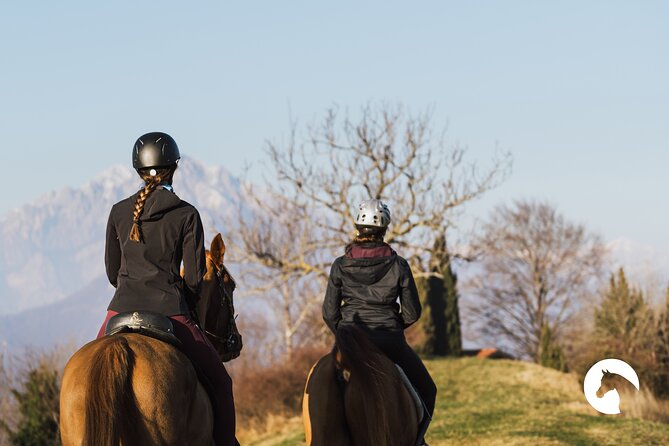 Horseback riding for experts between the lake and the mountains - The Horses and the Guide Factor (Martina, and Riccardo in the Team)