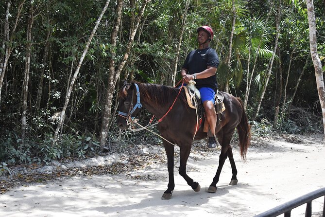 Horseback riding Tour with ATV circuit, ziplines and Cenote - Zipline course: flying high without turning the day slow