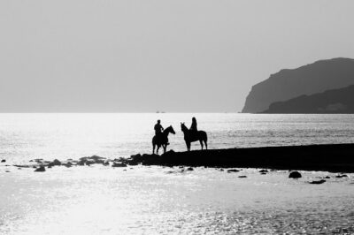 Santorini: Horse Riding to the Black Sandy Beach (Eros beach) - Eros Beach Arrival: Black Sand Views, Rocky Reality