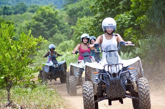 Zip-lining/Horseback Rides/Cat & Atv Inclusive Act with Transpo From Montego Bay - ATV 4-wheeler safari: desert-like trails, puddles, and the license rule